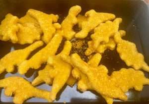 Chicken Nuggets in Form von Dinosauriern
