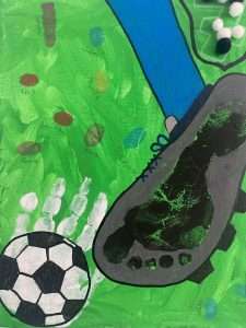 Fuß- und Handabdruck meines Sohnes zum Thema Fußball für die Fingerabdruck Leinwand