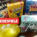 Über 25 Reisespiele für den Urlaub, unter anderem Wizard, Qwixx, 6 nimmt, Color'Yam, Tarantel Tango und Werwölfe, bereit zum Einpacken in den Koffer.