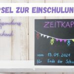 Beitragsbild mit dem Text "Zeitkapsel zur Einschulung" - ein ganz besonderes Geschenk mit einer Zeitkapsel in schwarz aus einer Schuhschachtel
