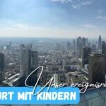 Beitragsbild mit dem Titel: Frankfurt mit Kindern - unser Ereignisreicher Tag mit Frankfurt im Hintergrund vom MainTower aus als Panoramabild