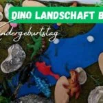 Kreative Dino-Landschaft Bastelaktivität für Kinder zum Geburtstag, inklusive Dinosaurierfiguren, Steine und Naturmaterialien, ideal für Kindergeburtstagsfeiern.
